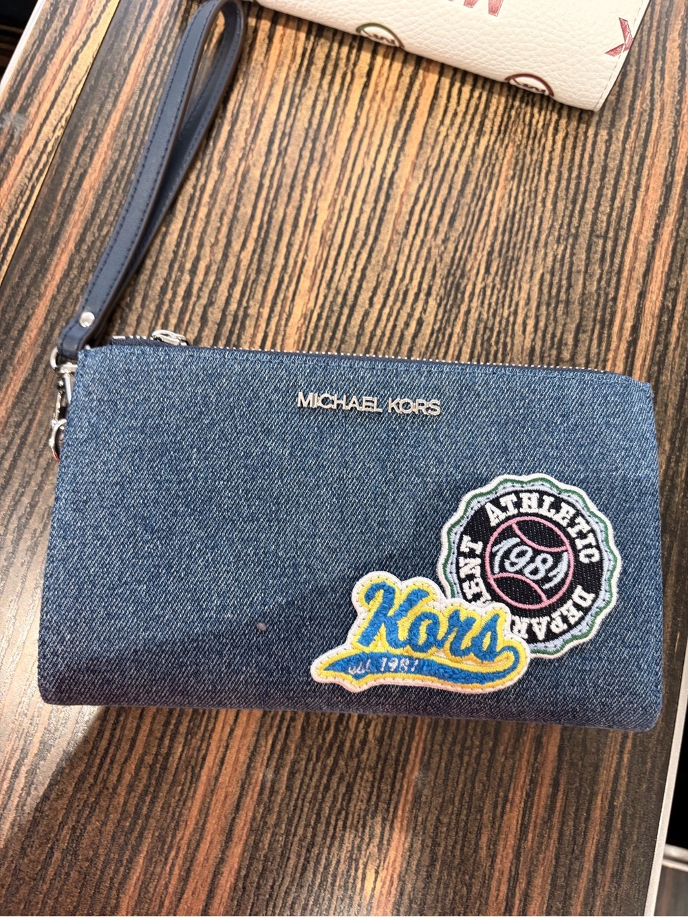 Michael Kors Denim Wristlet with Embroidered Patches new with tag